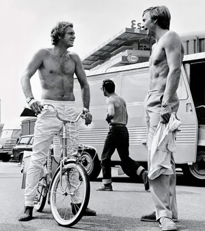 American Actor Steve Mcqueen With His Stuntman Wallpaper