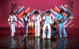 American Pop Band Jackson 5 During 1970 Performance Wallpaper