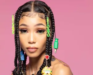 American Rapper, Coi Leray, Looking Towards The Distance Wallpaper