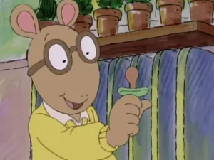 Amusing Arthur Read With A Baby Pacifier Wallpaper