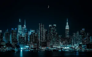 An Artistic View Of The Urban Landscape, With Vibrant Colors And Enchanting Night Lights In Night City. Wallpaper