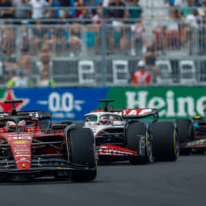 An Electrifying Night Race At A Formula 1 Grand Prix Wallpaper