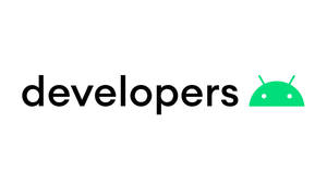 An Enthusiastic Android Developer Programming On Their Laptop. Wallpaper