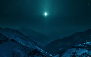 An Evening View Of The Majestic Night Mountain Wallpaper