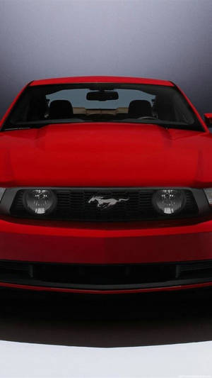 An Iphone Displaying Gps Navigation In A Car Wallpaper