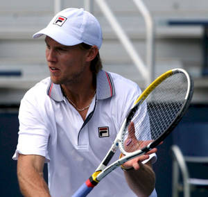 Andreas Seppi In White Cap Playing Tennis Wallpaper