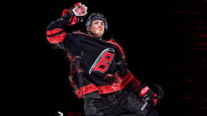 Andrei Svechnikov Of The Carolina Hurricanes In High Intensity Action Wallpaper