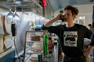 Andrew Garfield At A Diner Wallpaper