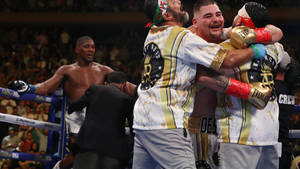Andy Ruiz With Coaches Wallpaper