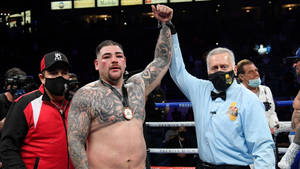 Andy Ruiz With Referee Wallpaper