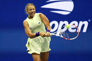 Anett Kontaveit Swings Blue Backdrop Wallpaper