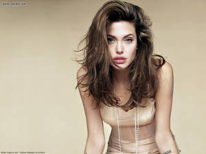 Angelina Jolie Wearing Beige Undershirt Wallpaper