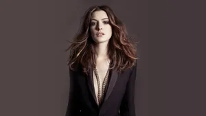 Anne Hathaway In Black Suit Wallpaper