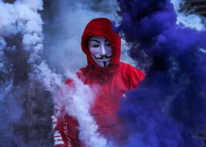 Anonymous In Blue Smoke Wallpaper