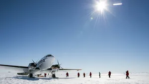 Antarctica With Airplane And People Wallpaper
