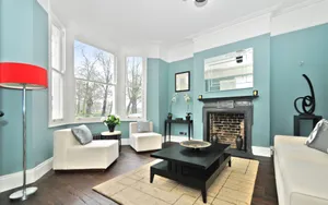 Apartment With Pastel Blue Wall Wallpaper