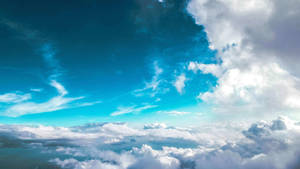 Aqua Blue Sky And Cloud Wallpaper