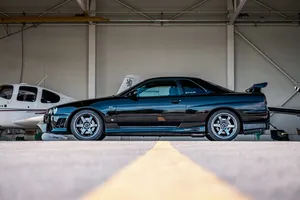 Aquamarine Nissan Skyline Gtr R34 Wallpaper