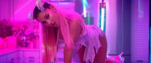 Ariana Grande Is Surrounded By The Luxury Of 7 Rings. Wallpaper