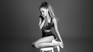 Ariana Grande On Stall Chair Photography Wallpaper