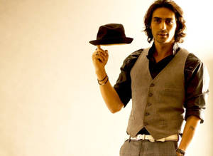 Arjun Rampal Spinning A Fedora Hat Wallpaper