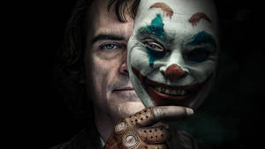 Arthur Holding Clown Mask Joker 2019 Wallpaper