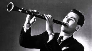 Artie Shaw In A Captivating Clarinet Performance Wallpaper