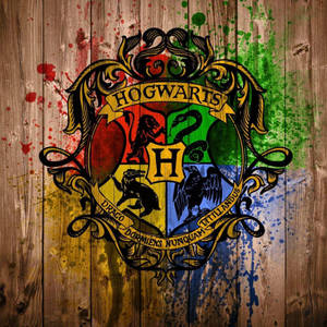 Artistic Hogwarts Crest Paint Wallpaper