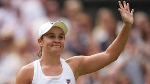 Ashleigh Barty Waving To The Audience Wallpaper