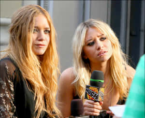 Ashley Olsen Looking Radiant On The Red Carpet Wallpaper