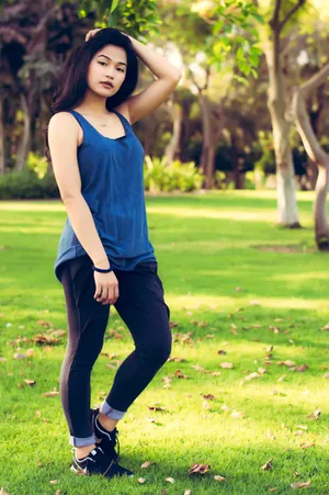 Asian Woman In Blue Tank Top Wallpaper