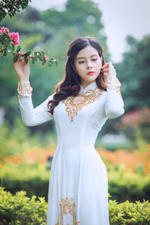 Asian Woman In Stunning White Dress Wallpaper
