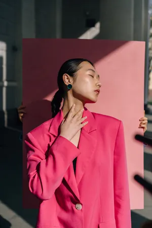 Asian Woman In Stylish Red Suit Wallpaper