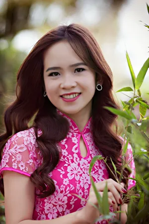 Asian Woman In Traditional Chinese Qipao Wallpaper