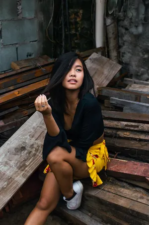Asian Woman In Yellow Skirt Wallpaper