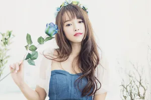 Asian Woman With Rare Blue Rose Wallpaper