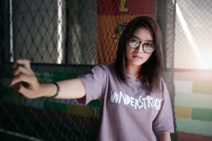 Asian Woman With Serious Facial Expression Wallpaper