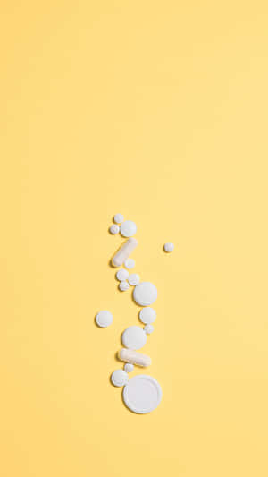 Assorted Pillson Yellow Background Wallpaper