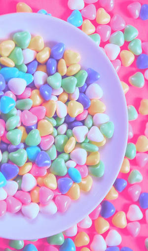 Assorted Sweet Candies In Vibrant Colors Wallpaper
