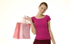 Assortment Of Elegant Pink Shopping Bags Wallpaper