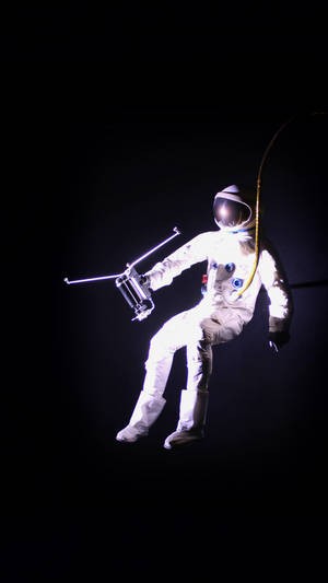 Astronaut Exploring Empty Space Wallpaper