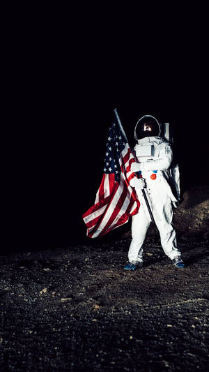 Astronaut Holding Us Flag Photography Wallpaper