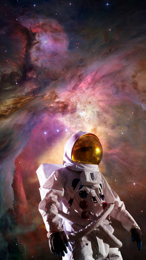 Astronaut In Purple Nebula Wallpaper