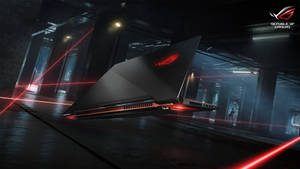 Asus Rog 4k Gaming Laptop And Lasers Wallpaper