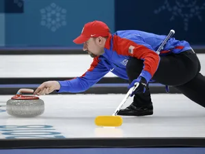 Athletes Sliding The Stones In Curling Wallpaper