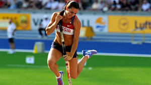 Athletic Olympic Champion Yelena Isinbayeva Wallpaper