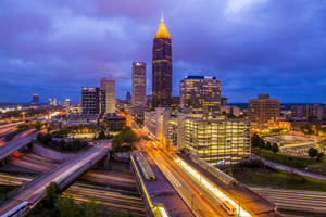 Atlanta Skyline With Bright Roads Wallpaper