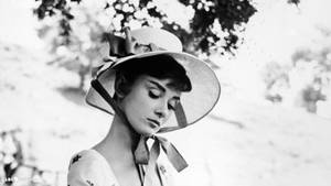 Audrey Hepburn In Wide Hat Wallpaper