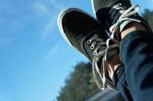 Authentic Black Vans Skate Shoes Wallpaper