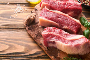 Authentic Kobe Beef Slices On Wooden Board Wallpaper